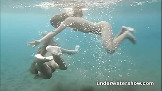 Julia together with Masha are swimming nude in the tons